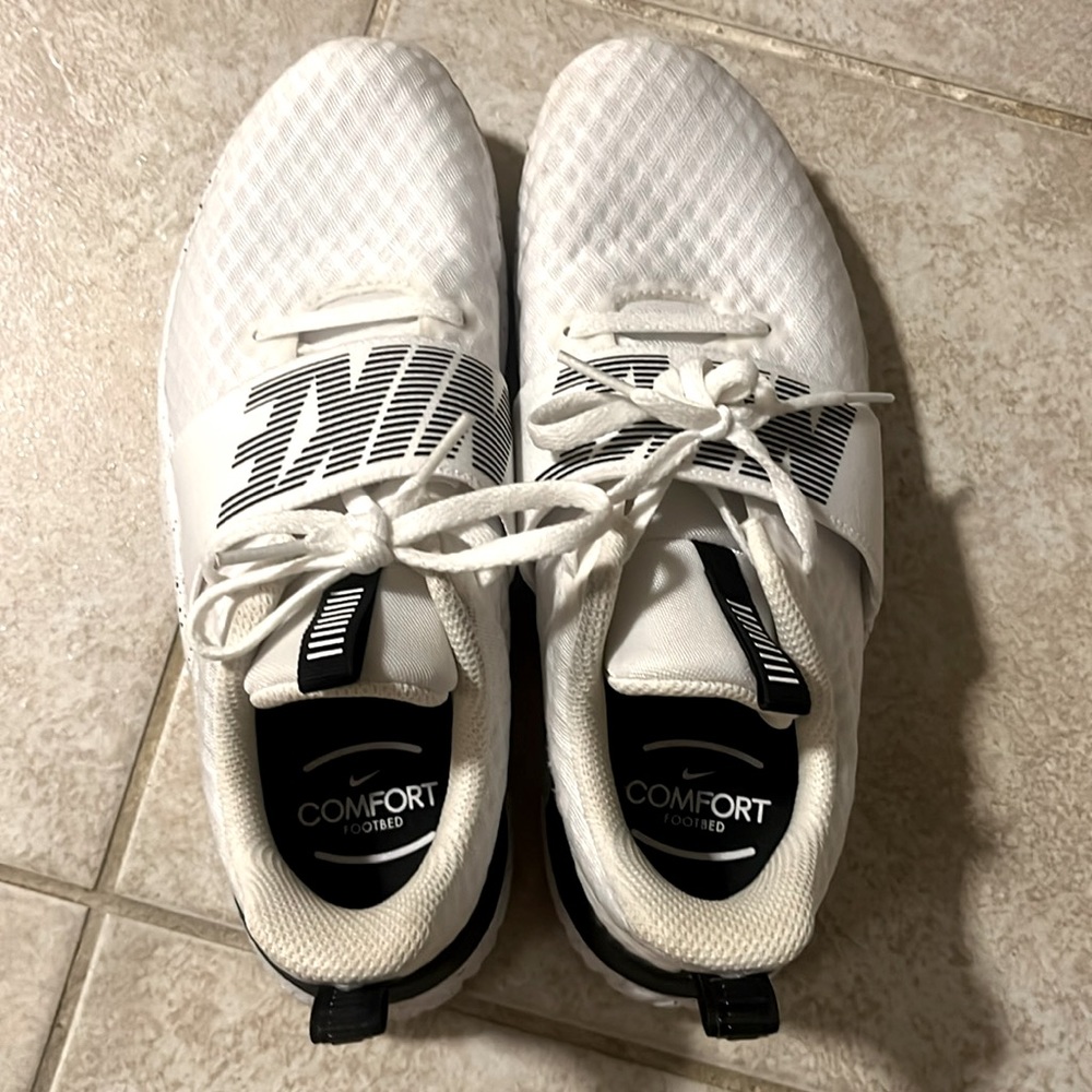 White Nike running shoes
